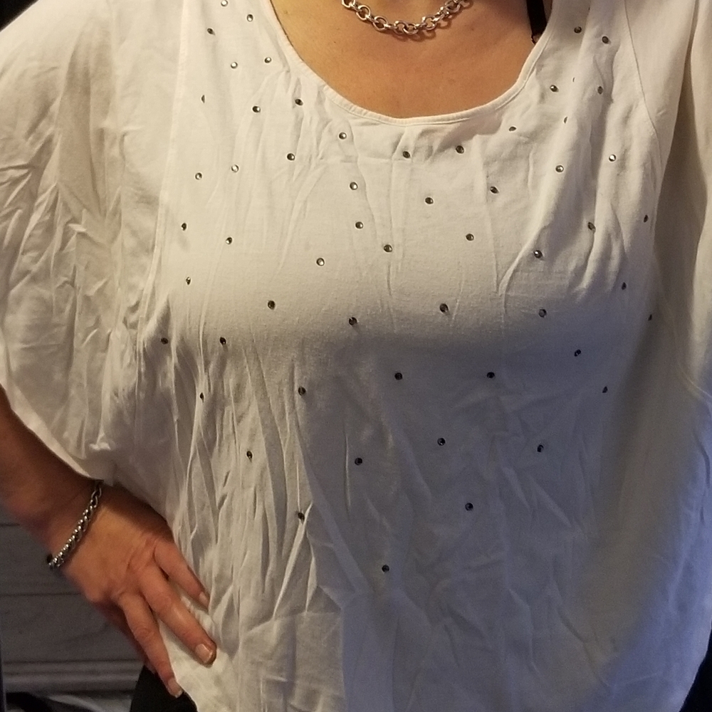 Cream colored poncho like top